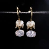 Xuhui brand exquisite copper plated with real gold and decorated with zircon shell flowers, fashionable ear hooks Item Picture